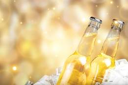 two light beers on ice